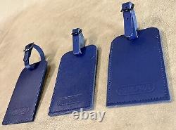 Ensemble de 3 étiquettes de bagages en cuir RIMOWA bleu.